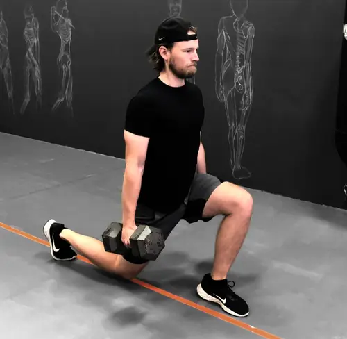 keeping most pressure on the front leg, while allowing the back leg to be the support (as a kickstand), and the shoulders above the hips at all time are some of the key point to execute the walking lunges properly.
